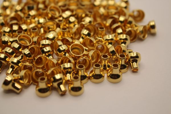 Produzione_Trattamenti superficiali_pezzi imbutiti_doratura_rivestimento in oro